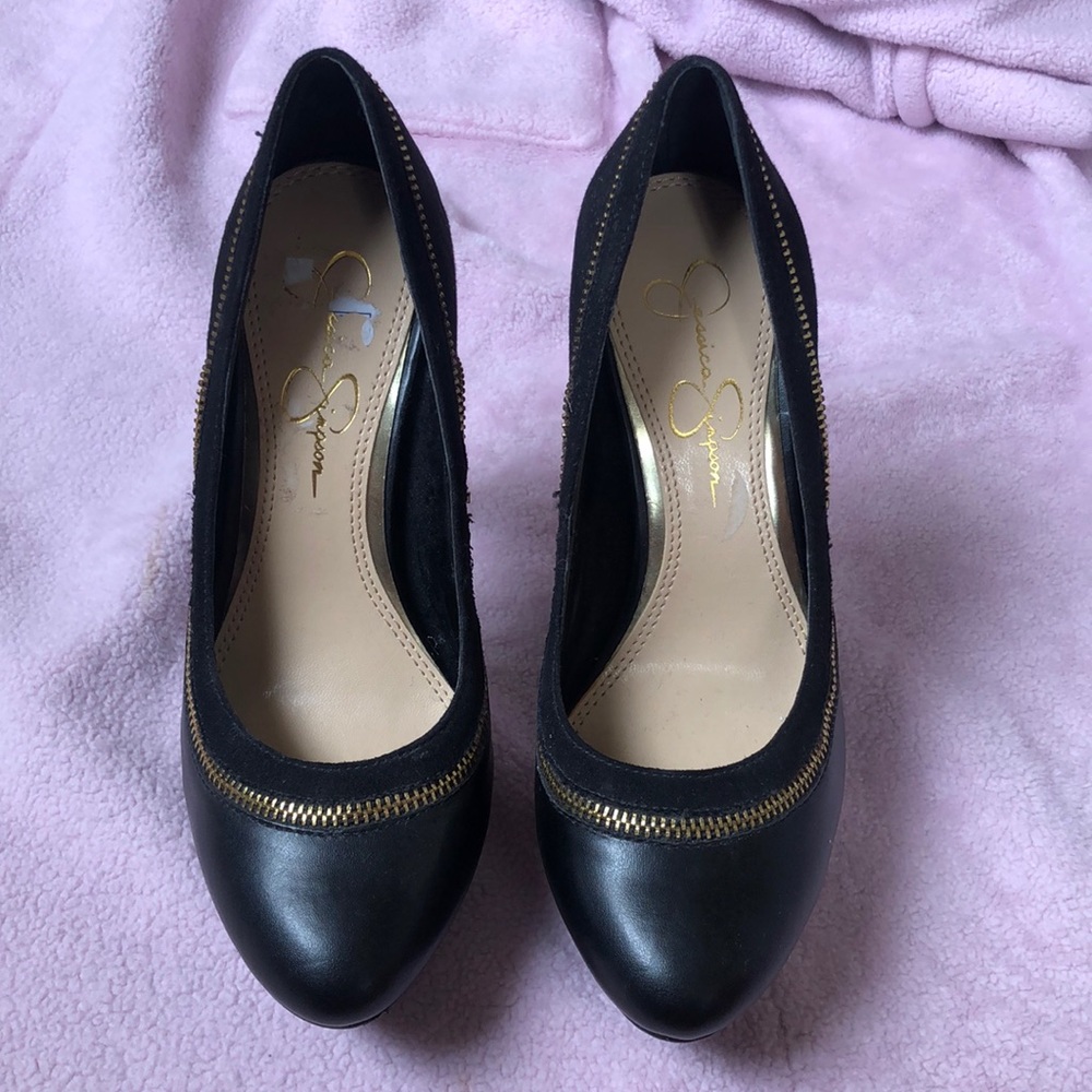 Worn only to try on. Sexy black pumps.